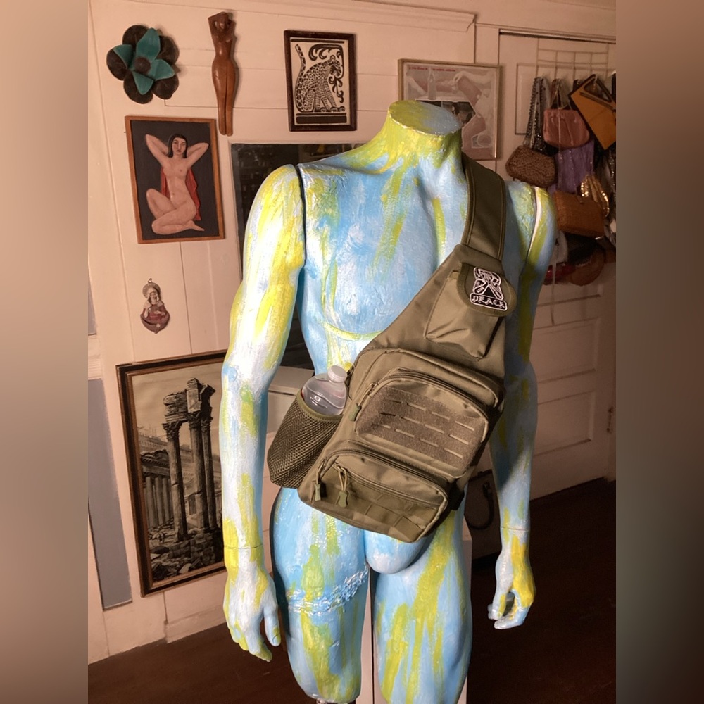 NWOT World Peace crossbody backpack